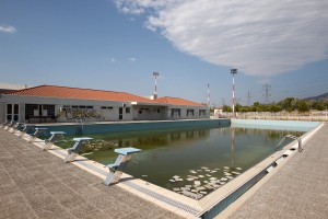 a-training-pool-is-left-murky-at-the-olympic-village