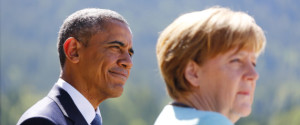 U.S. President Obama and German Chancellor Merkel make speeches after signing the guest book in Kruen