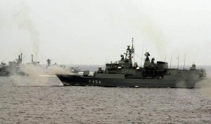 Shots are fired from the Greek frigate Psara during military exercises in the Aegean Sea on Tuesday, September 12, 2000. Chiefs of Staff of NATO member states are in Greece for their annual Military Committee Conference that includes the attendance of joint military exercises and a series of social events. (AP Photo/Dimitri Messinis/POOL)
