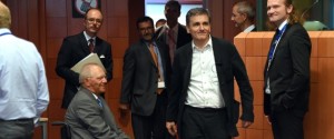 German Finance Minister Wolfgang Schauble (CL) and Greece's Finance Minister Euclid Tsakalotos (CR) attend an extraordinary Eurogroup meeting on Greece at the European Council in Brussels, on August 14, 2015. Eurozone finance ministers are scheduled to meet to go over a new bailout programme in return for reforms by Greece, but some of the creditors feel Athens' pledges are not precise enough. AFP PHOTO/Emmanuel Dunand (Photo credit should read EMMANUEL DUNAND/AFP/Getty Images)