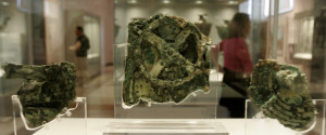 Fragments of the 2,100-year-old Antikythera Mechanism, believed to be the earliest surviving mechanical computing device, are seen at the National Archaeological Museum in Athens, Thursday, Nov. 30, 2006. The bronze system of cogs and wheels was found in a Roman wreck off southern Greece in 1900. It is the focus of a two-day conference starting in Athens Thursday, with the participation of scientists from Greece, Britain, the U.S. and other countries. (AP Photo/Thanassis Stavrakis)