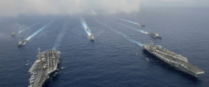 The Nimitz-class aircraft carriers USS John C. Stennis (CVN 74), and USS Ronald Reagan (CVN 76) (R) conduct dual aircraft carrier strike group operations in the U.S. 7th Fleet area of operations in support of security and stability in the Indo-Asia-Pacific in the Philippine Sea on June 18, 2016. Courtesy Jake Greenberg/U.S. Navy/Handout via REUTERS ATTENTION EDITORS - THIS IMAGE WAS PROVIDED BY A THIRD PARTY. EDITORIAL USE ONLY