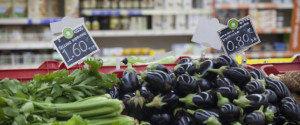 Euro price signs sit on vegetables, including celery, left, and aubergines, right, for sale inside a Carrefour SA supermarket, part of the Marinopoulos Group, in Limassol, Cyprus, on Monday, Sept. 8, 2014. The Cypriot economy contracted 0.3% in 2Q from previous quarter, vs 0.6% q/q drop in 1Q, according to seasonally adjusted estimates posted on Cyprus Statistical Service website. Photographer: Andrew Caballero-Reynolds/Bloomberg via Getty Images