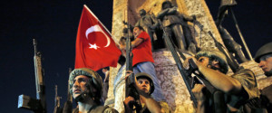 Turkish soldiers secure the area as supporters of Turkey's President Recep Tayyip Erdogan protest in Istanbul's Taksim square, early Saturday, July 16, 2016. Turkey's prime minister says a group within Turkey's military has engaged in what appeared to be an attempted coup. Binali Yildirim told NTV television: "it is correct that there was an attempt." (AP Photo/Emrah Gurel)