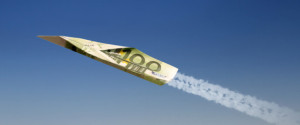 Airplane made of 100 EURO against blue sky