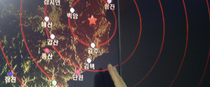 An official of the Earthquake and Volcano of the Korea Monitoring Division points at the epicenter of seismic waves in North Korea, in Seoul, South Korea, Friday, Sept. 9, 2016. South Korea's Yonhap news agency says Seoul believes North Korea has conducted its fifth nuclear test explosion. (AP Photo/Ahn Young-joon)