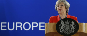 British Prime Minister Theresa May answers a question from the media during the final press briefing at the EU Summit in Brussels, Friday, Oct. 21, 2016. Britains prime minister vowed on Thursday that the U.K. would continue to exert it full rights in the workings of the European Union until it leaves the 28-nation bloc. (AP Photo/Alastair Grant)