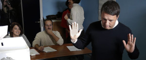 Italian Premier Matteo Renzi gesticulates after casting his ballot at a polling station in Pontassieve, Italy, Sunday, Dec. 4, 2016. Italians voted Sunday in a referendum on constitutional reforms that Premier Matteo Renzi has staked his political future on. Premier Matteo Renzi has said he would resign if the reforms are rejected in Sunday’s vote, and opposition politicians have vowed to press for a new government if voters reject the proposed constitutional changes. (AP Photo/Antonio Calanni)