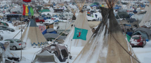 CANNON BALL, ND - NOVEMBER 30: Snow covers Oceti Sakowin Camp near the Standing Rock Sioux Reservation on November 30, 2016 outside Cannon Ball, North Dakota. Native Americans and activists from around the country have been gathering at the camp for several months trying to halt the construction of the Dakota Access Pipeline. The proposed 1,172 mile long pipeline would transport oil from the North Dakota Bakken region through South Dakota, Iowa and into Illinois. (Photo by Scott Olson/Getty Images)