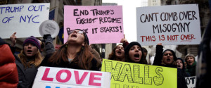 Protesters against U.S. President-elect Donald Trump shout slogans while demonstrating near Trump Tower in the Manhattan borough of New York, U.S. November 20, 2016. REUTERS/Mark Kauzlarich