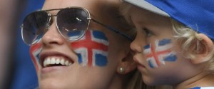 An Iceland's supporter and her child are pictured ahead of the Euro 2016 group F football match between Iceland and Hungary at the Stade Velodrome in Marseille on June 18, 2016. / AFP / BORIS HORVAT (Photo credit should read BORIS HORVAT/AFP/Getty Images)
