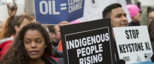 Opponents of the Keystone XL and Dakota Access pipelines hold a rally as they protest US President Donald Trump's executive orders advancing their construction, at Lafayette Park next to the White House in Washington, DC, on January 24, 2017. US President Donald Trump signed executive orders Tuesday reviving the construction of two controversial oil pipelines, but said the projects would be subject to renegotiation. / AFP / SAUL LOEB (Photo credit should read SAUL LOEB/AFP/Getty Images)