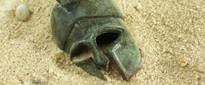 Greec helmet in sand