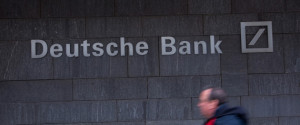 A pedestrian passes a Deutsche Bank AG office in Frankfurt, Germany, on Thursday, Feb. 2, 2017. Frankfurt expects as many 10,000 workers from Britain's financial services industry to relocate to Germany's banking capital because of Brexit, with the exodus likely to start within weeks, according to lobby group Frankfurt Main Finance. Photographer: Krisztian Bocsi/Bloomberg via Getty Images